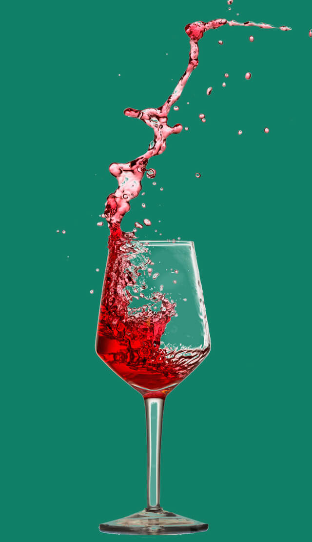 In this example, we enable the PNG transparency option and remove the background from a JPEG image of a wine glass. To make sure all greenish background colors are removed, we also match 30% of similar color shades in the JPEG. (Source: Pexels.)